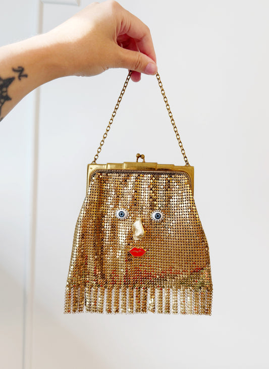 Ode to the masters gold mesh tassel purse