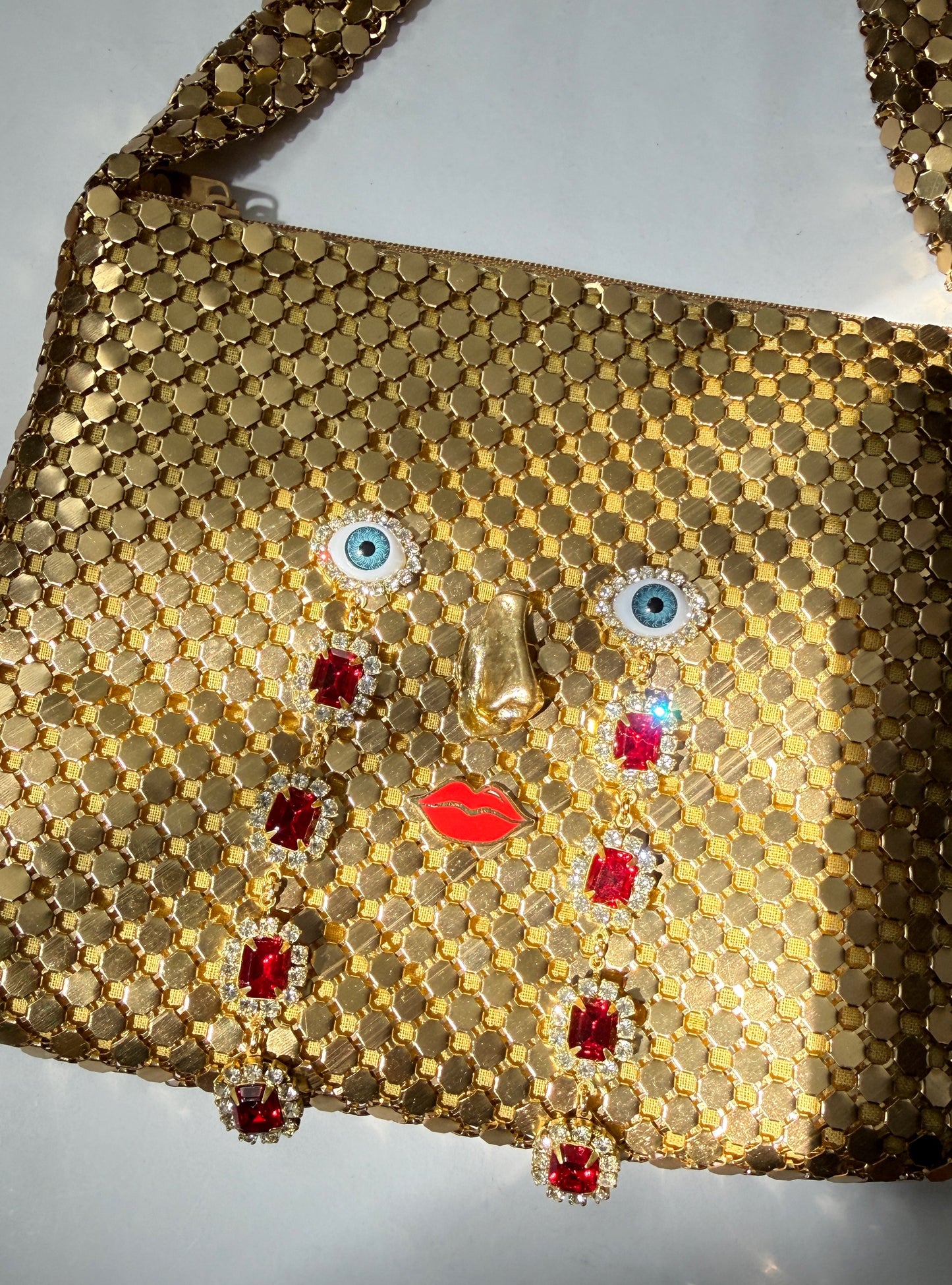 Ode to the master CRYBABY gold mesh purse