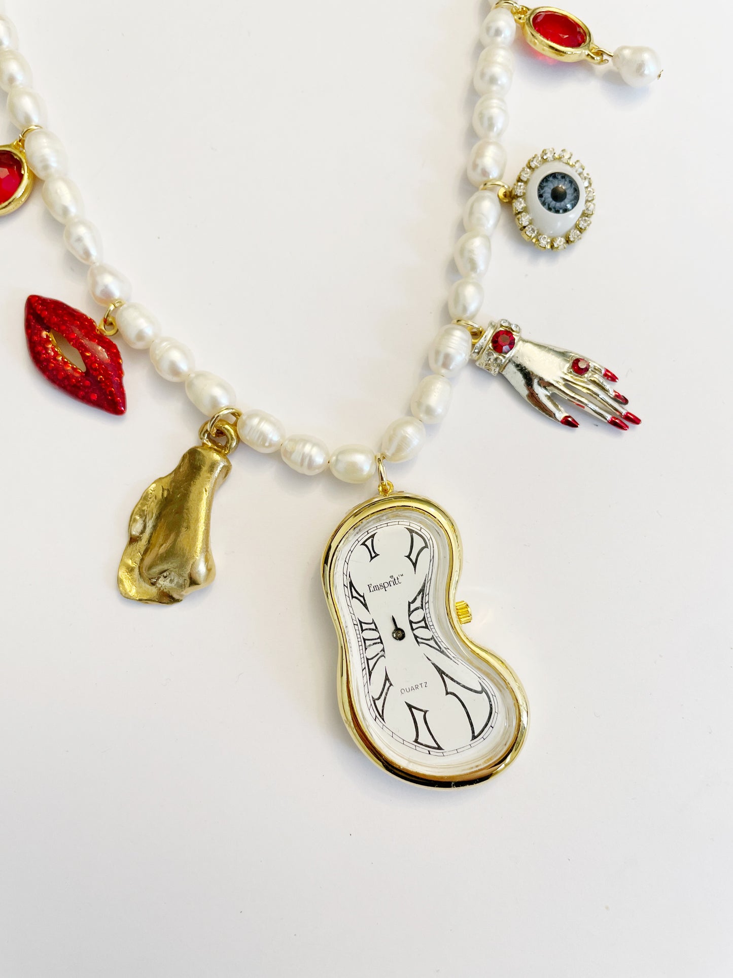 Miniature Marvels melting clock necklace