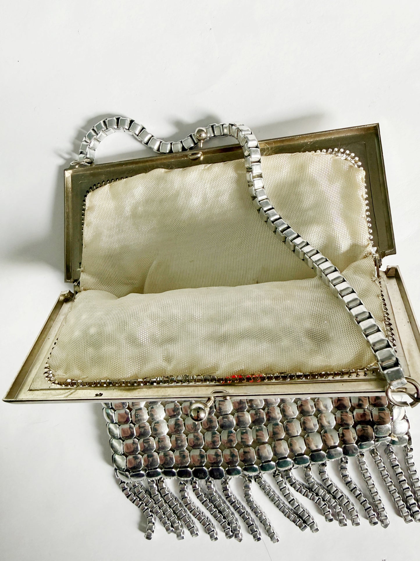 Ode to the master silver mesh purse