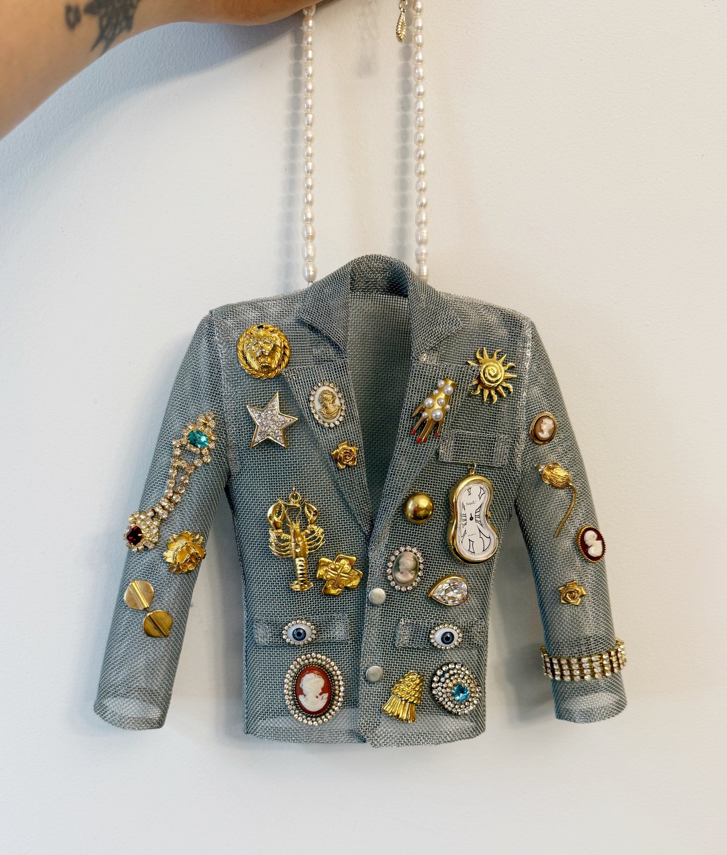 Surrealist dream blazer necklace