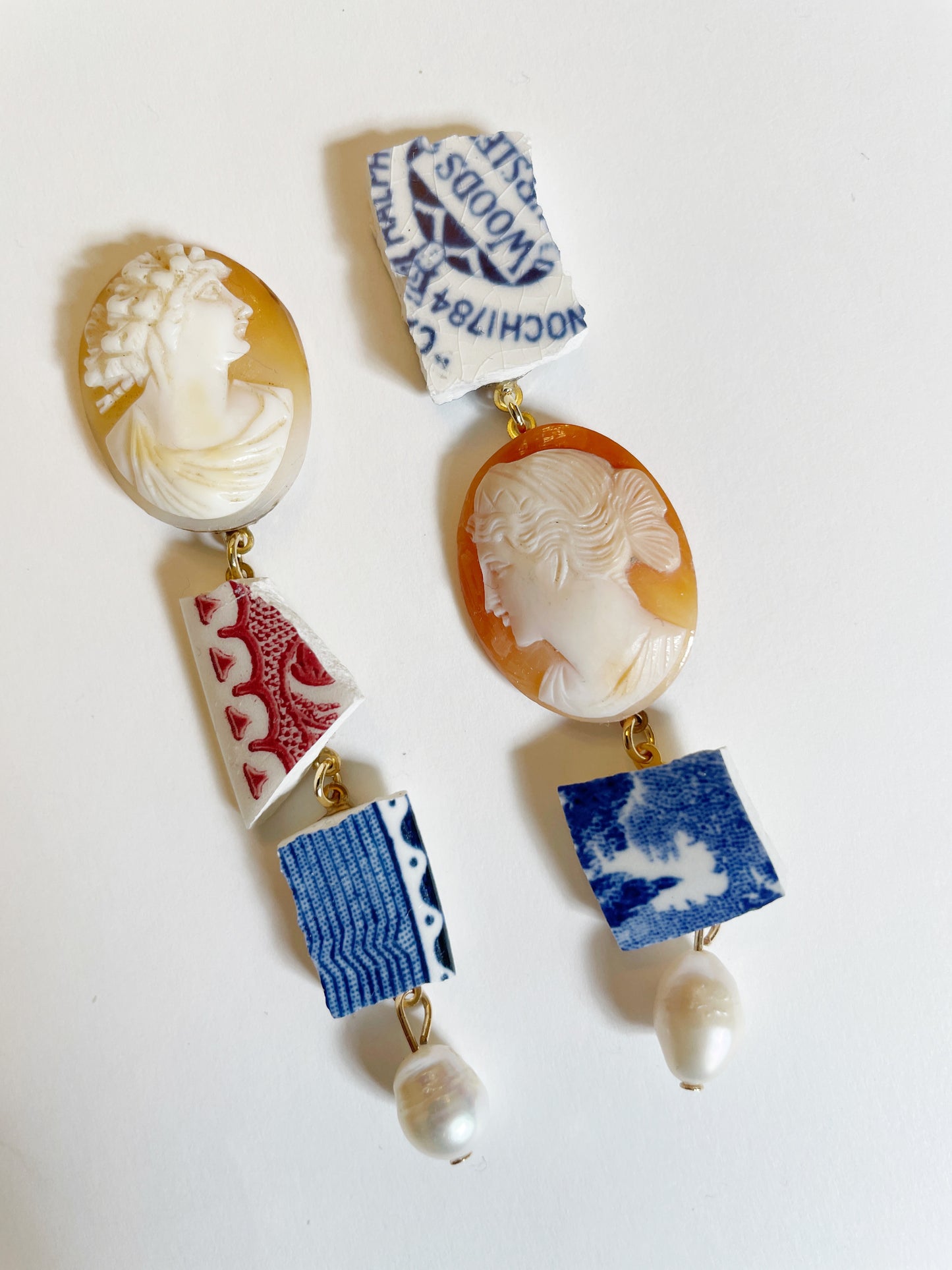 Curio cameo excavator earrings