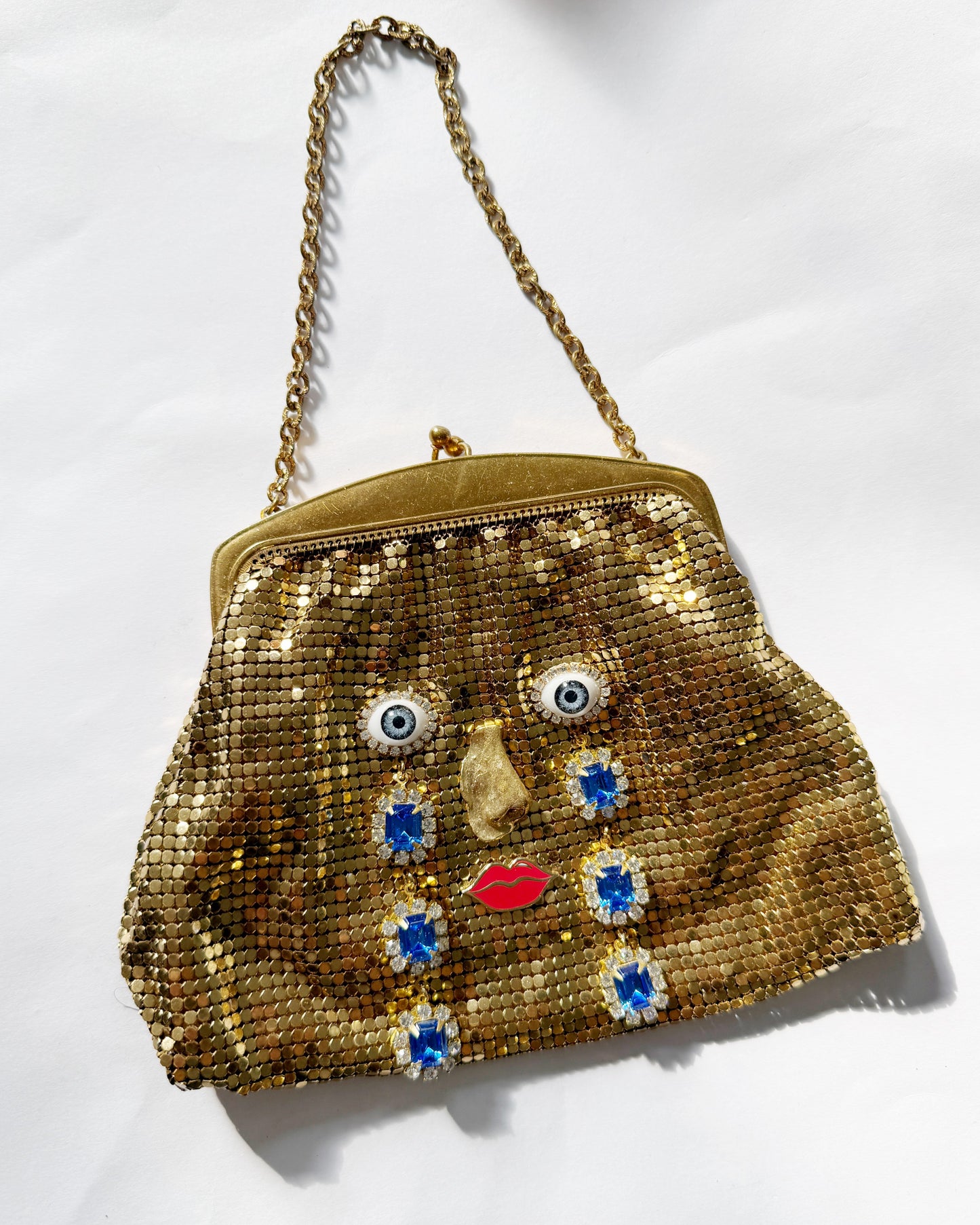 Ode to the master CRYBABY gold mesh purse