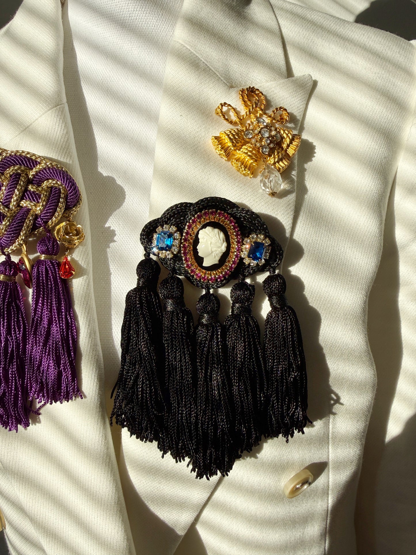 Rhinestone cameo knot tassel brooch