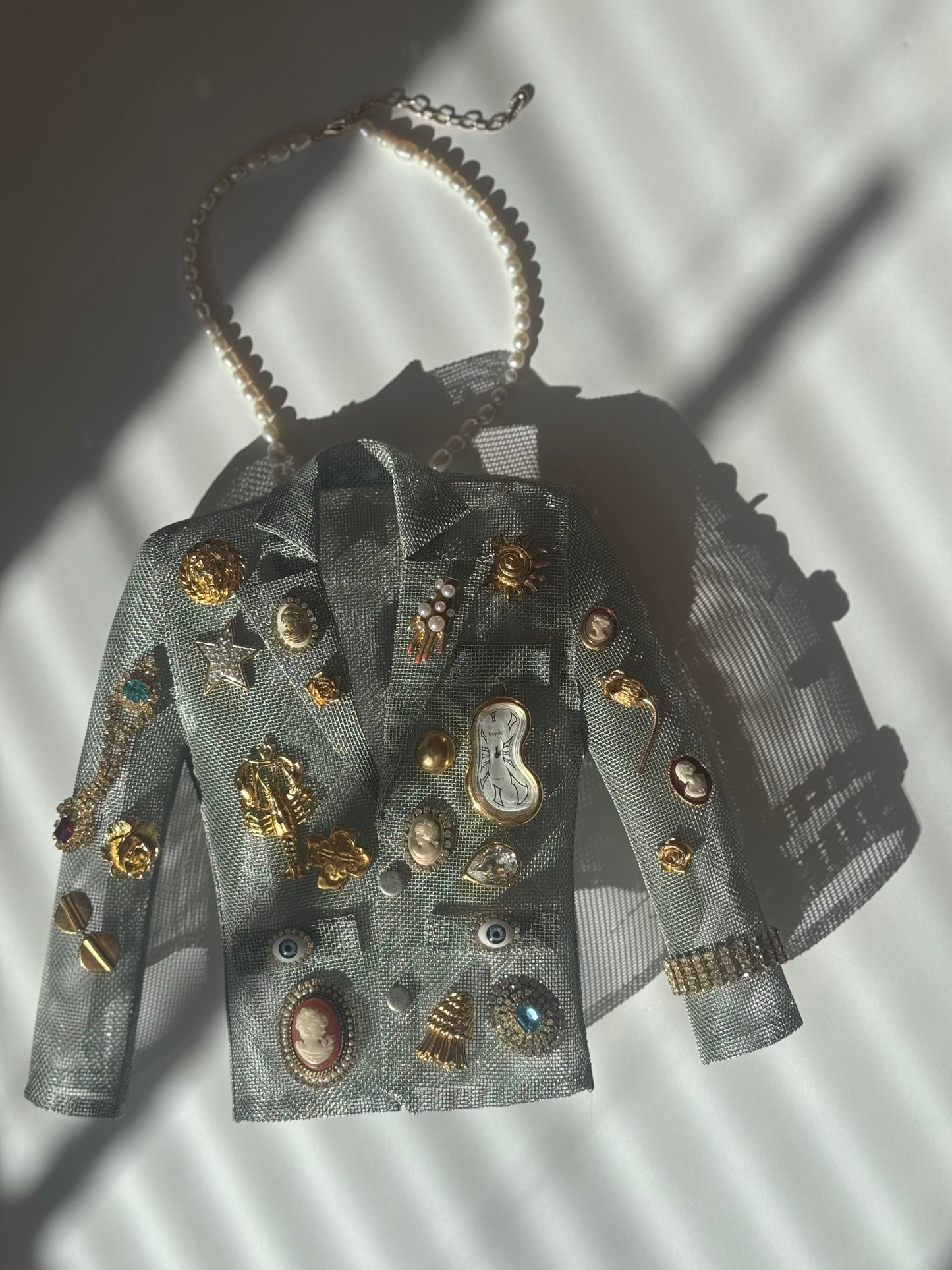 Surrealist dream blazer necklace