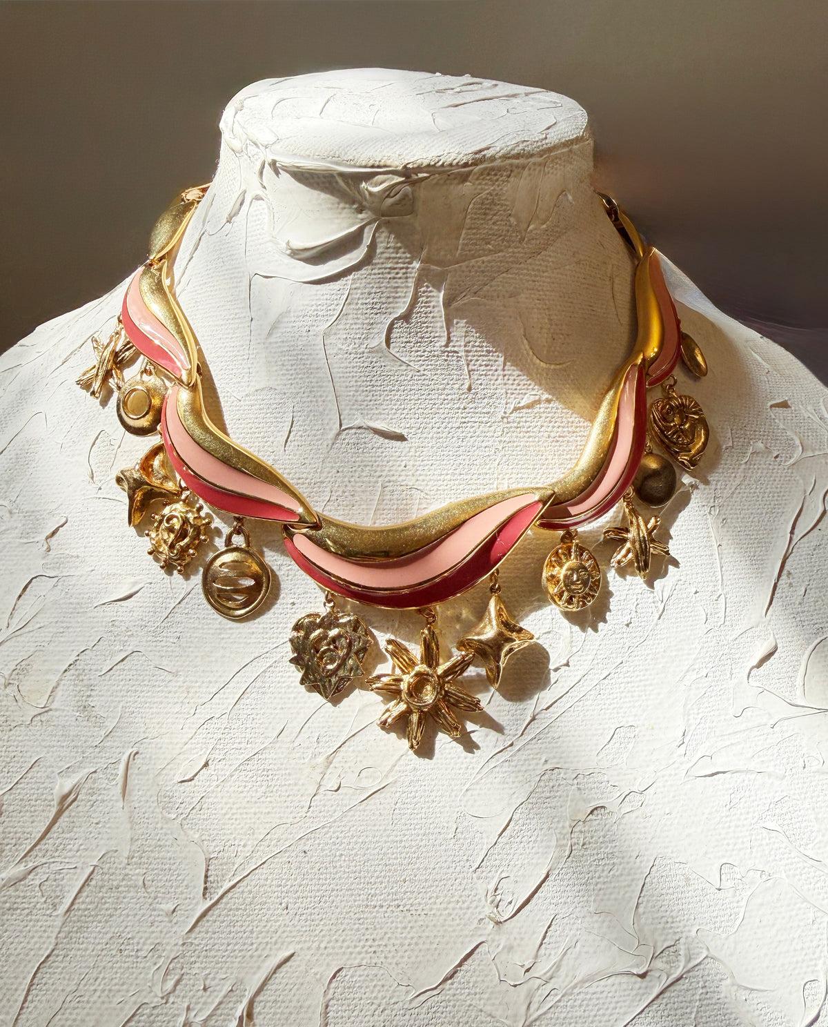 Pink enamel charm necklace