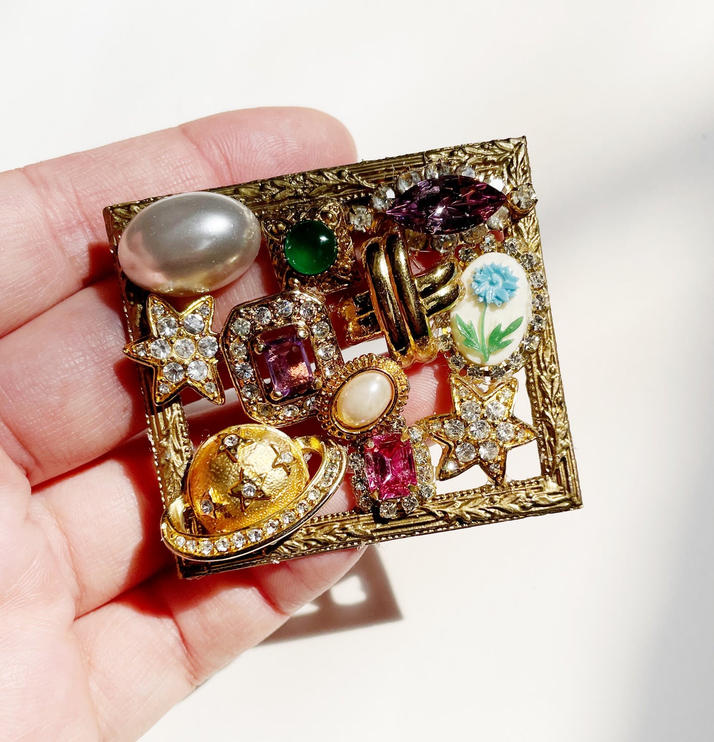 Miniature Marvels Saturns moon gallery wall brooch