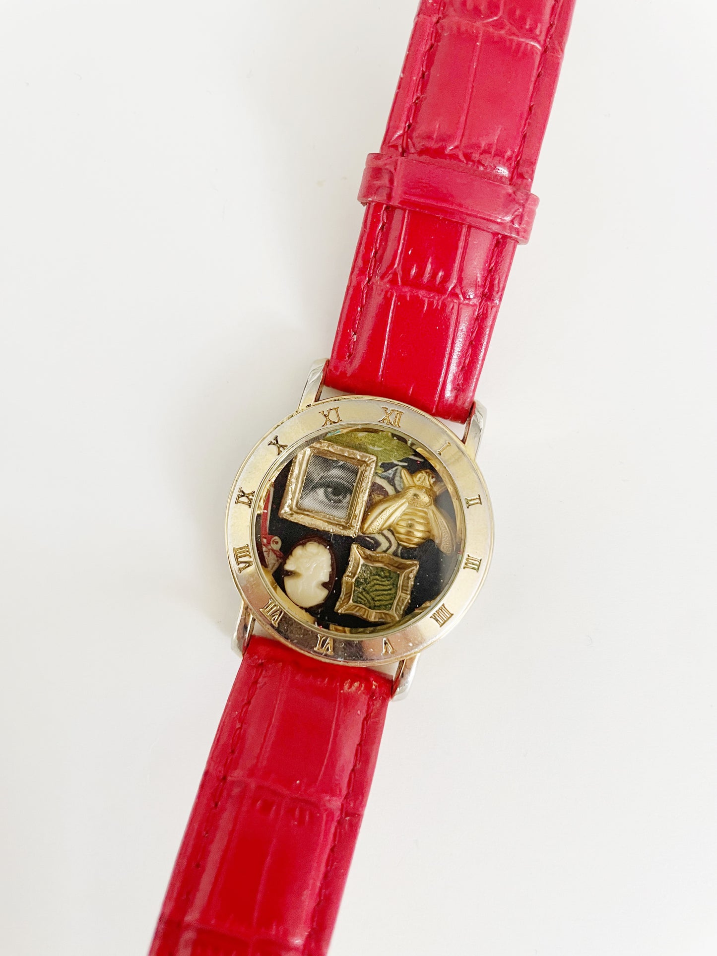 Miniature Marvels red gallery wall watch