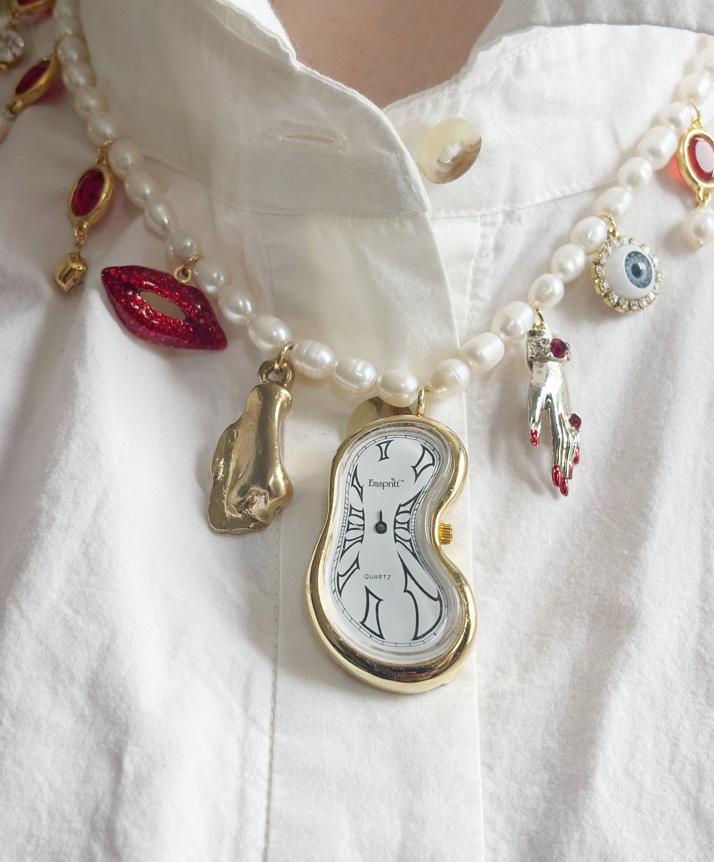 Miniature Marvels melting clock necklace