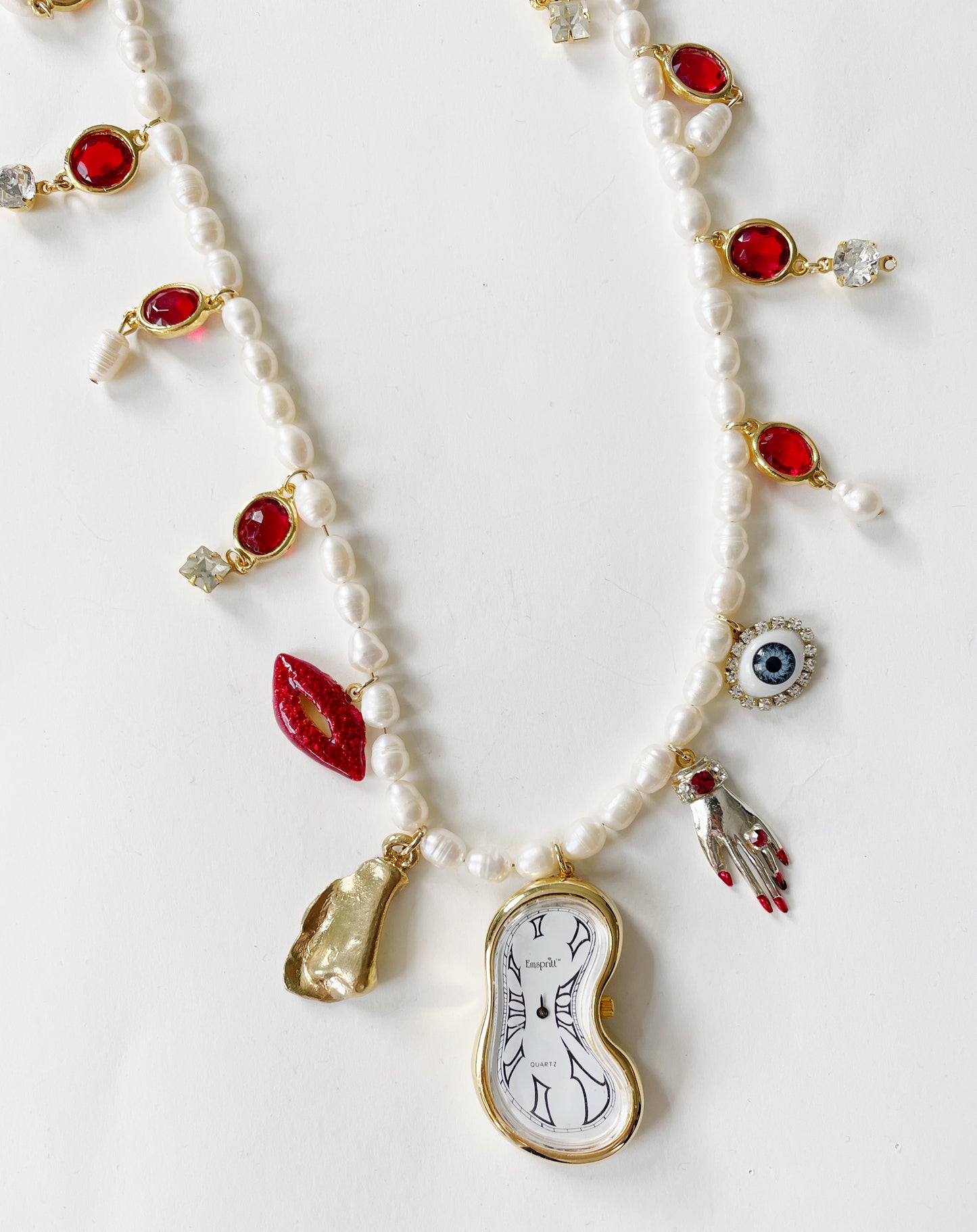 Miniature Marvels melting clock necklace