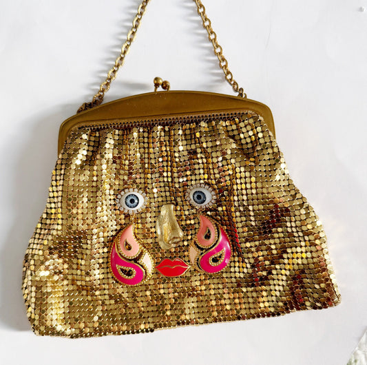 Ode to the master CRYBABY gold mesh purse