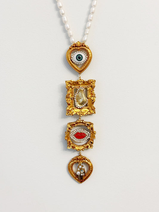Gallery wall surrealist dreamer tie necklace
