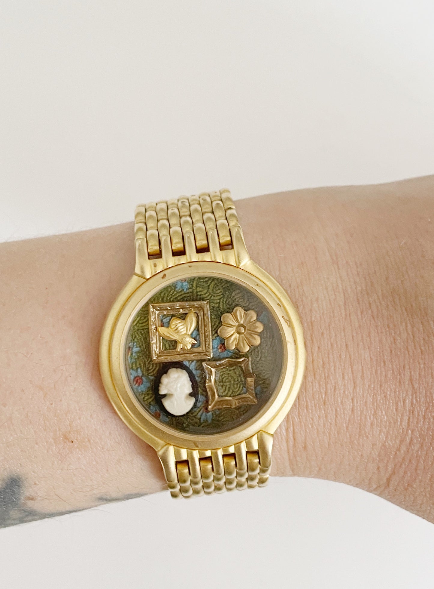 Miniature Marvels gallery wall watch