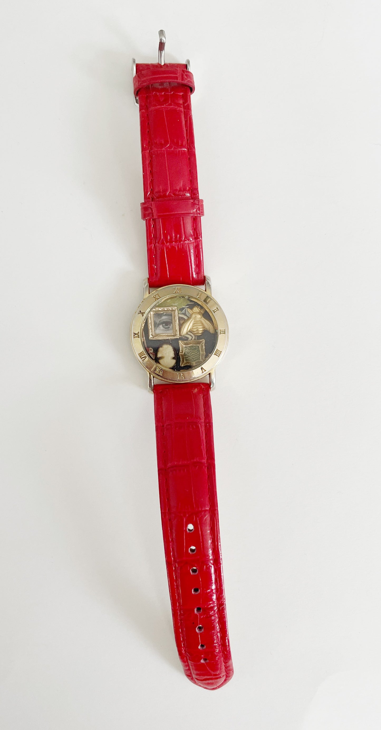 Miniature Marvels red gallery wall watch
