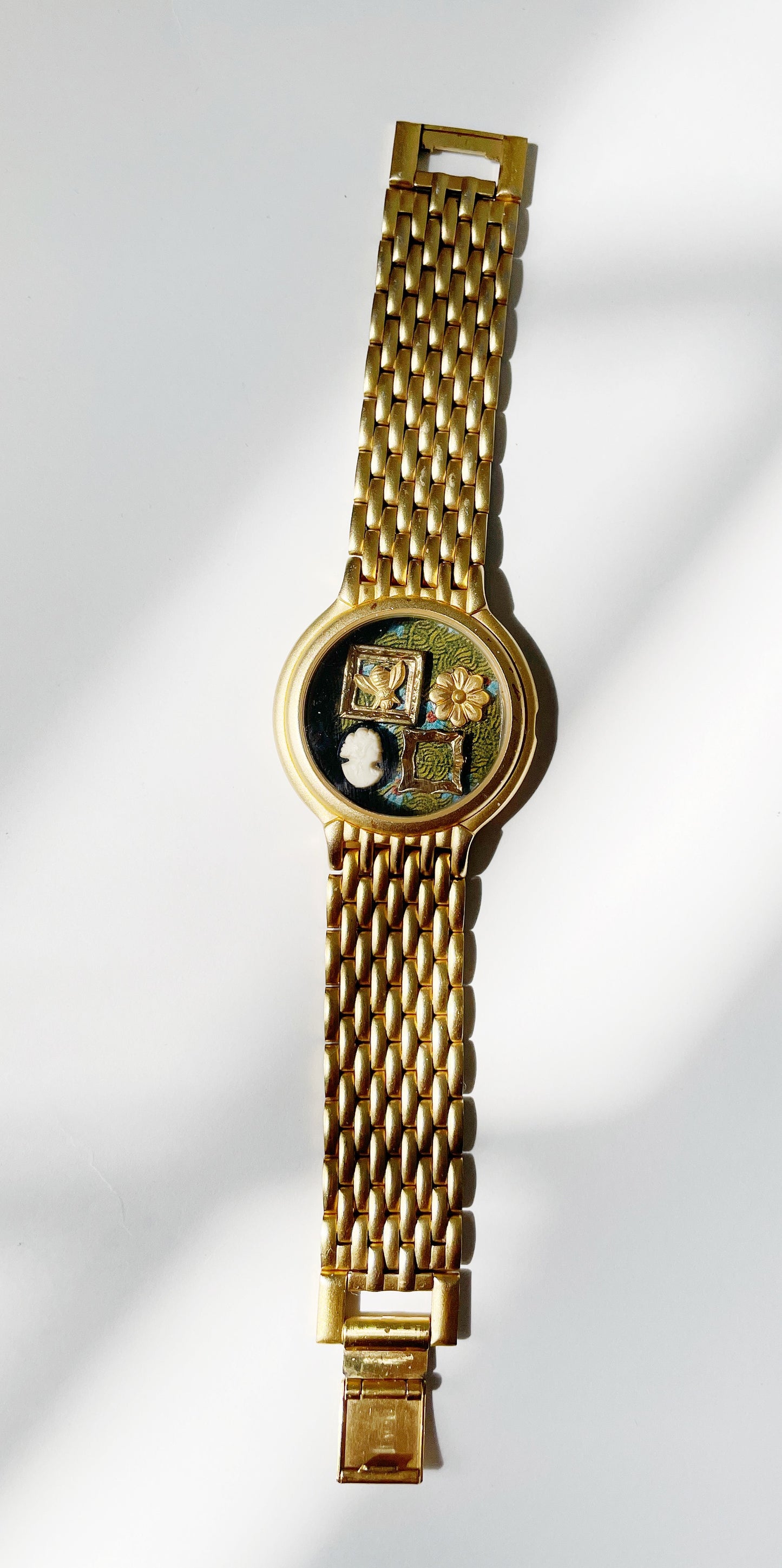 Miniature Marvels gallery wall watch