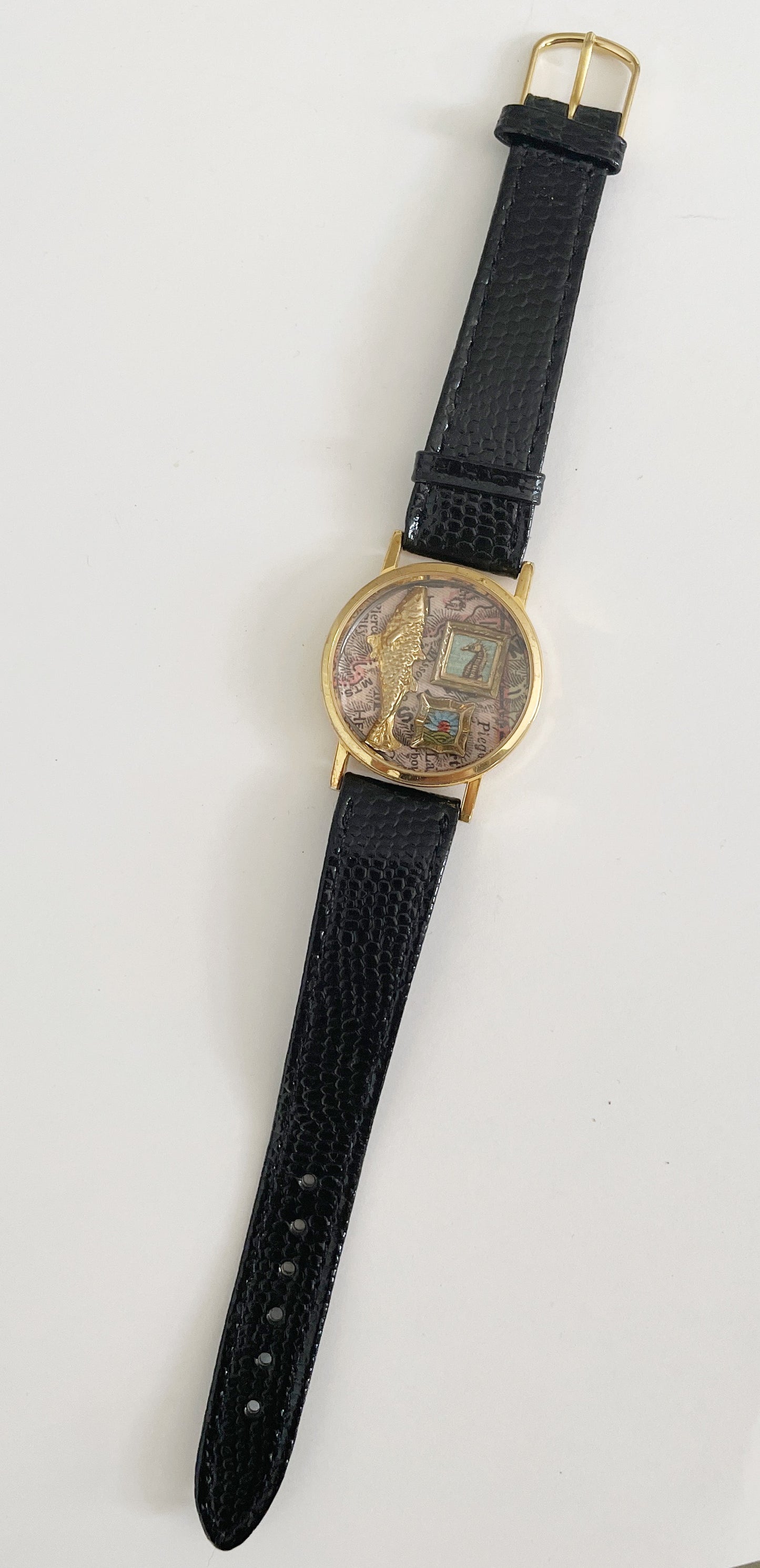 Miniature Marvels fish tales gallery wall watch