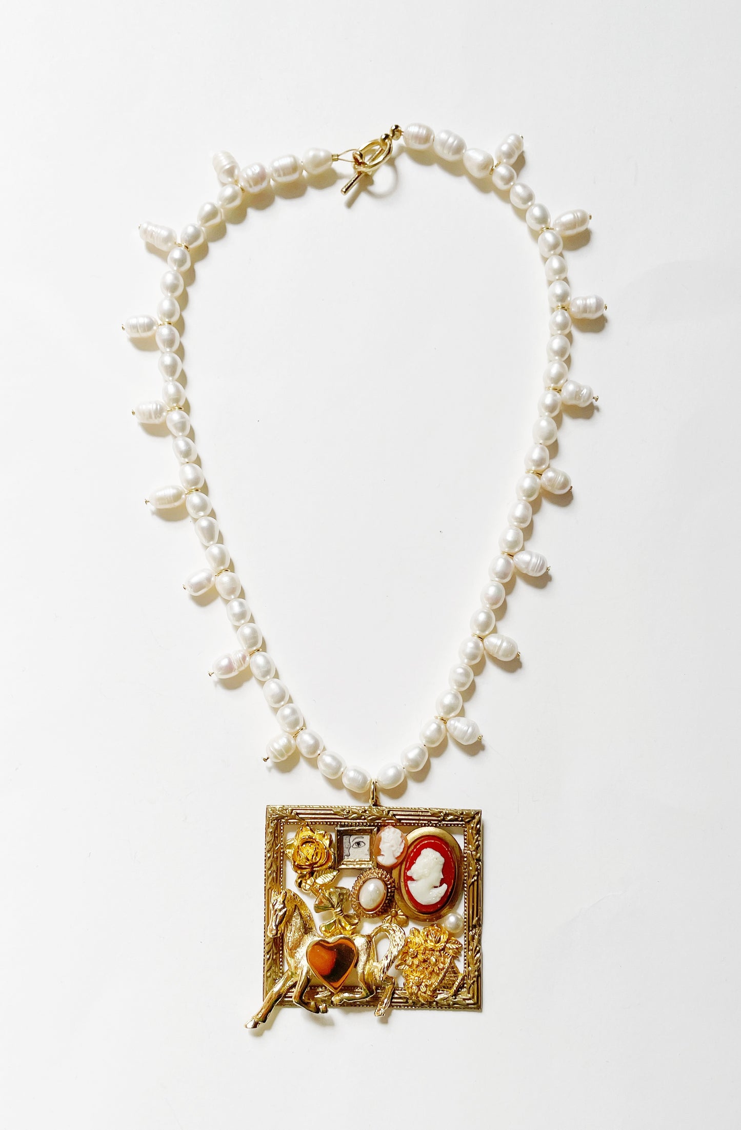 Miniature Marvels gallery wall pearl necklace