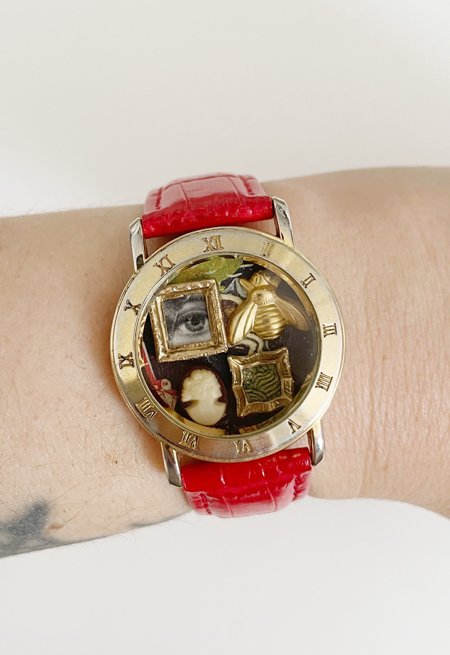 Miniature Marvels red gallery wall watch
