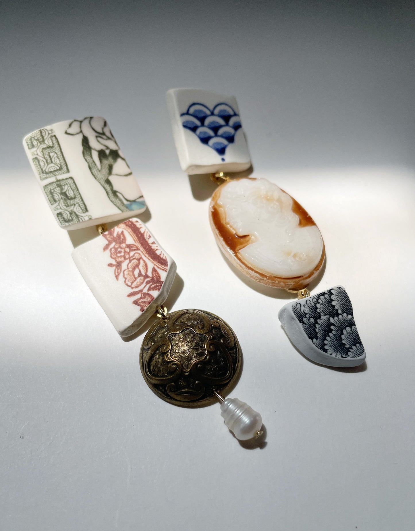 Curio cameo earrings