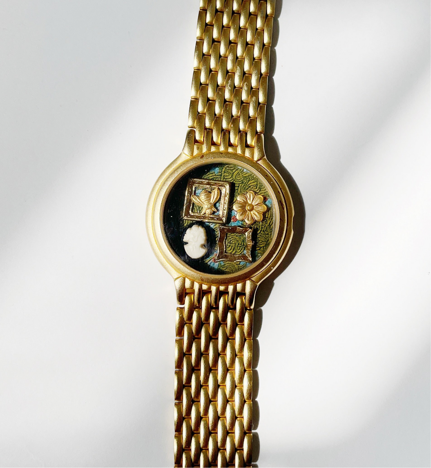 Miniature Marvels gallery wall watch