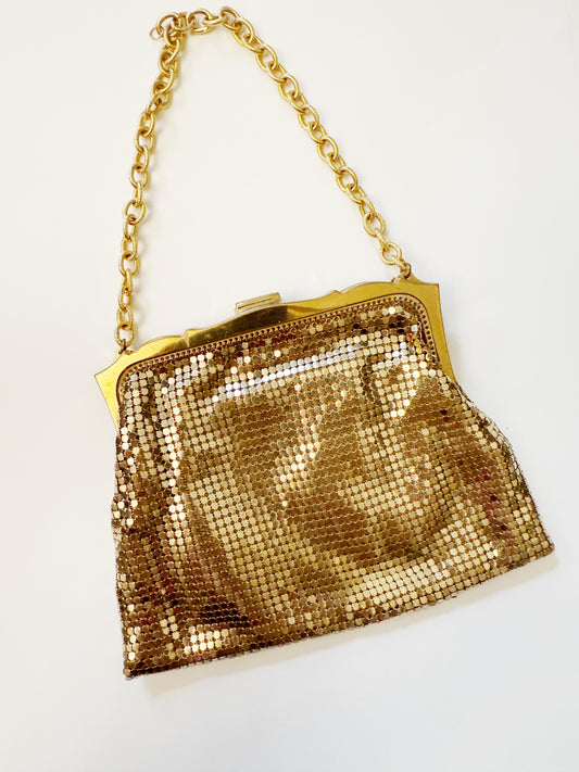 Ode to the masters gold mesh purse