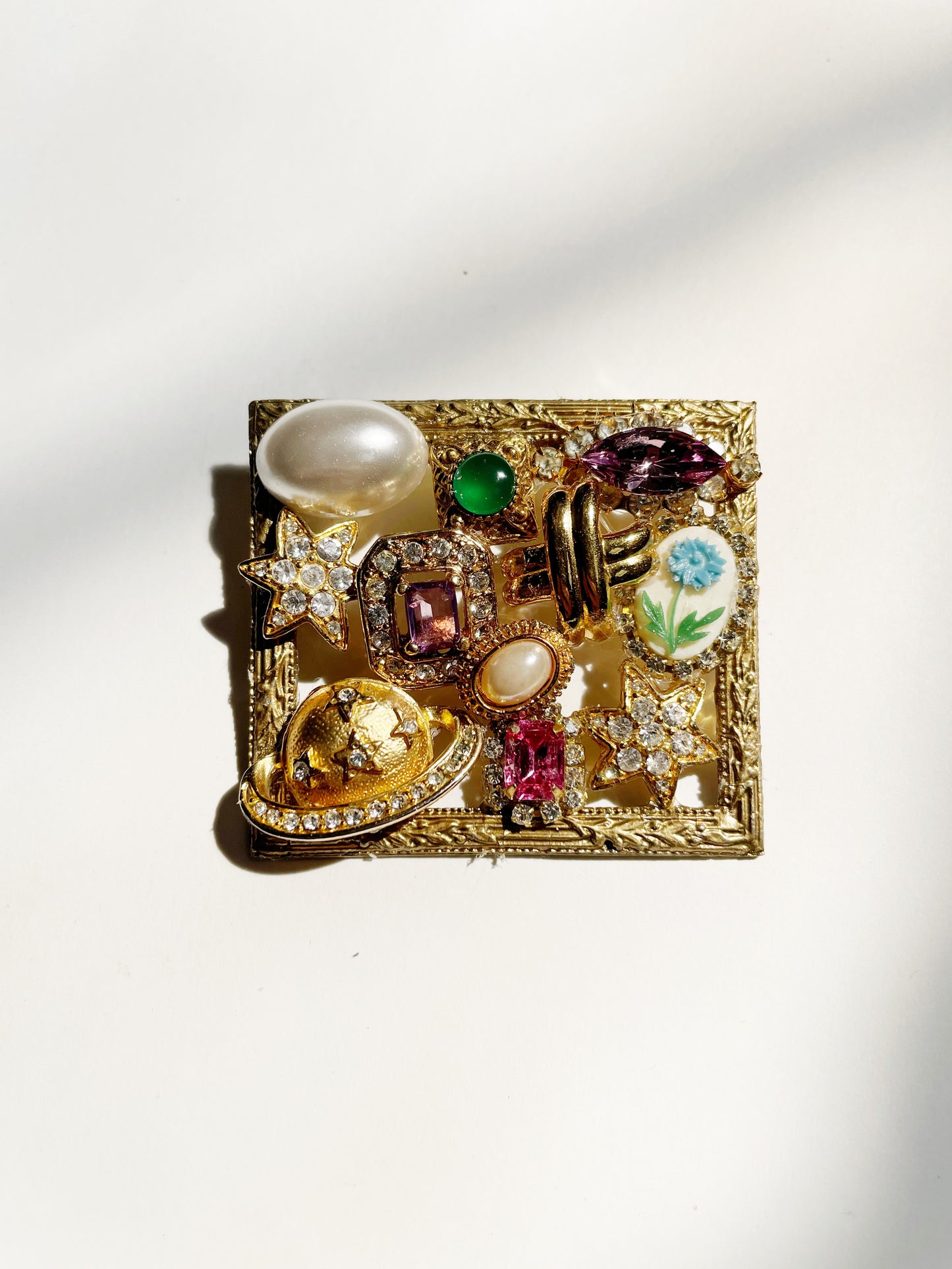 Miniature Marvels Saturns moon gallery wall brooch