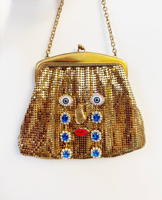 Ode to the master CRYBABY gold mesh purse