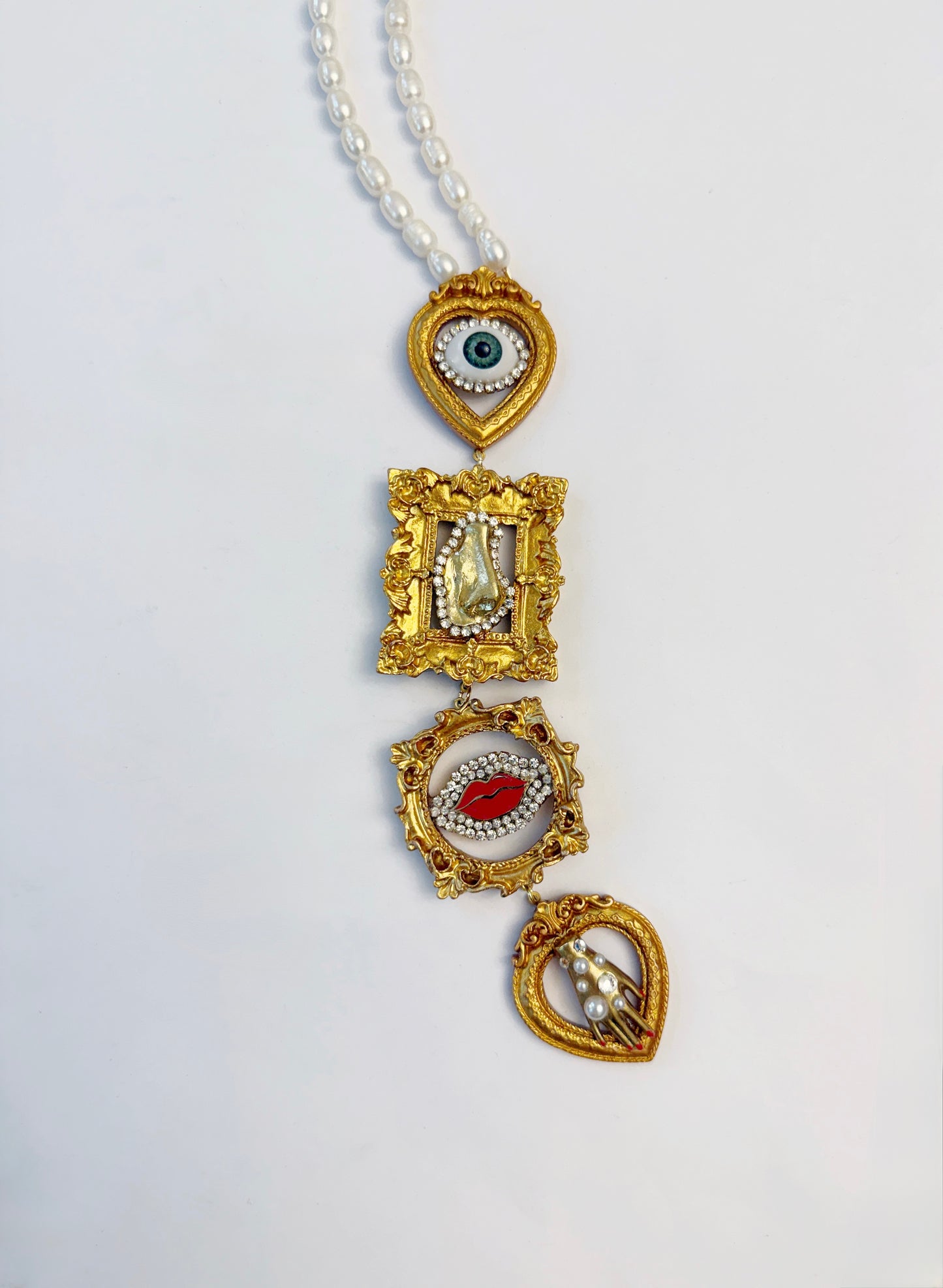 Gallery wall surrealist dream tie necklace