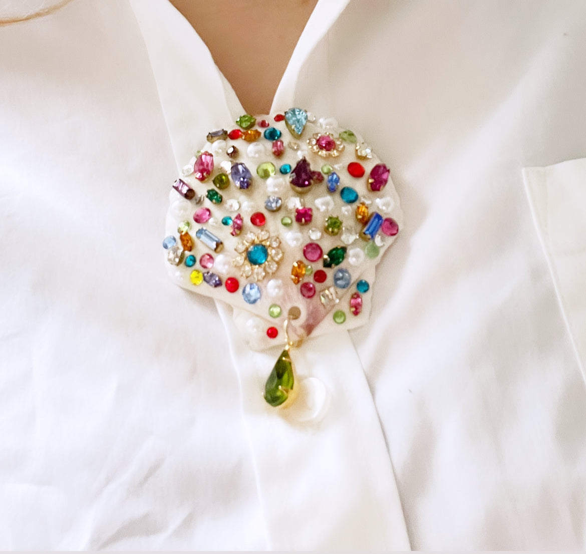 Shelled rhinestone party brooch