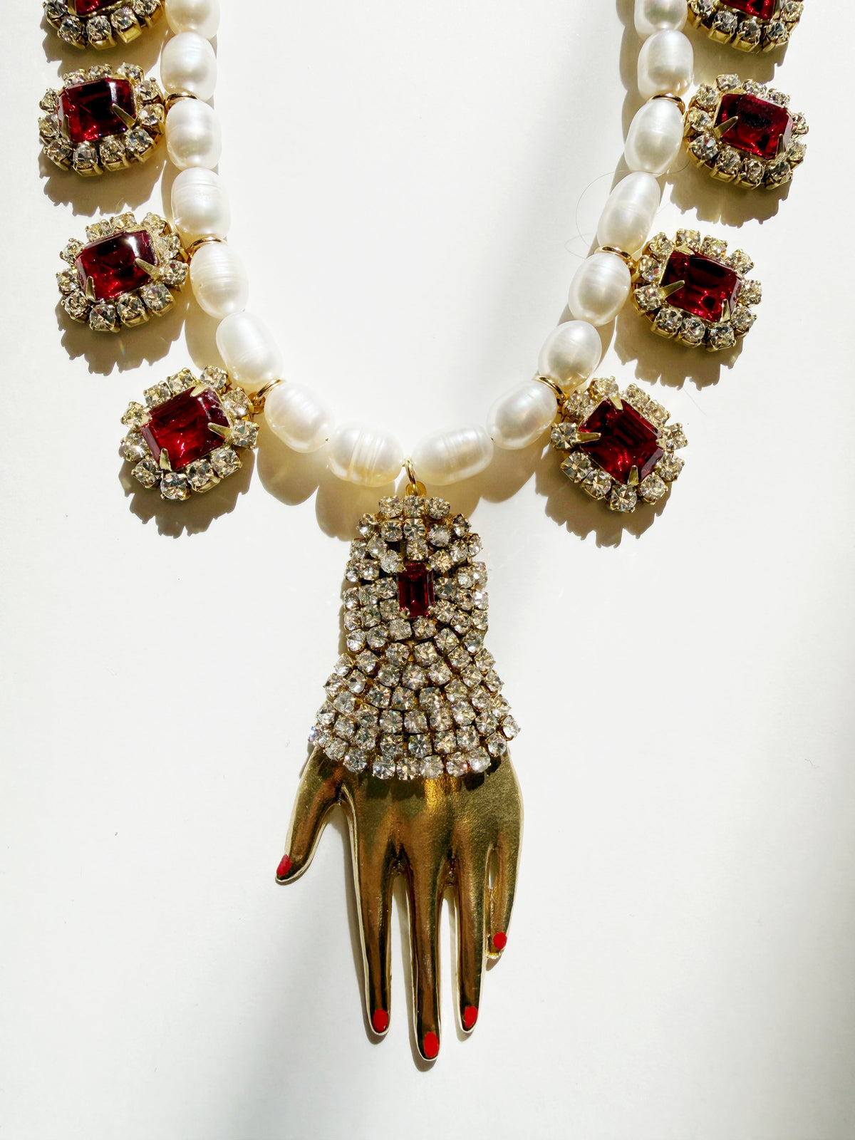 Regal rhinestone hand pearl necklace