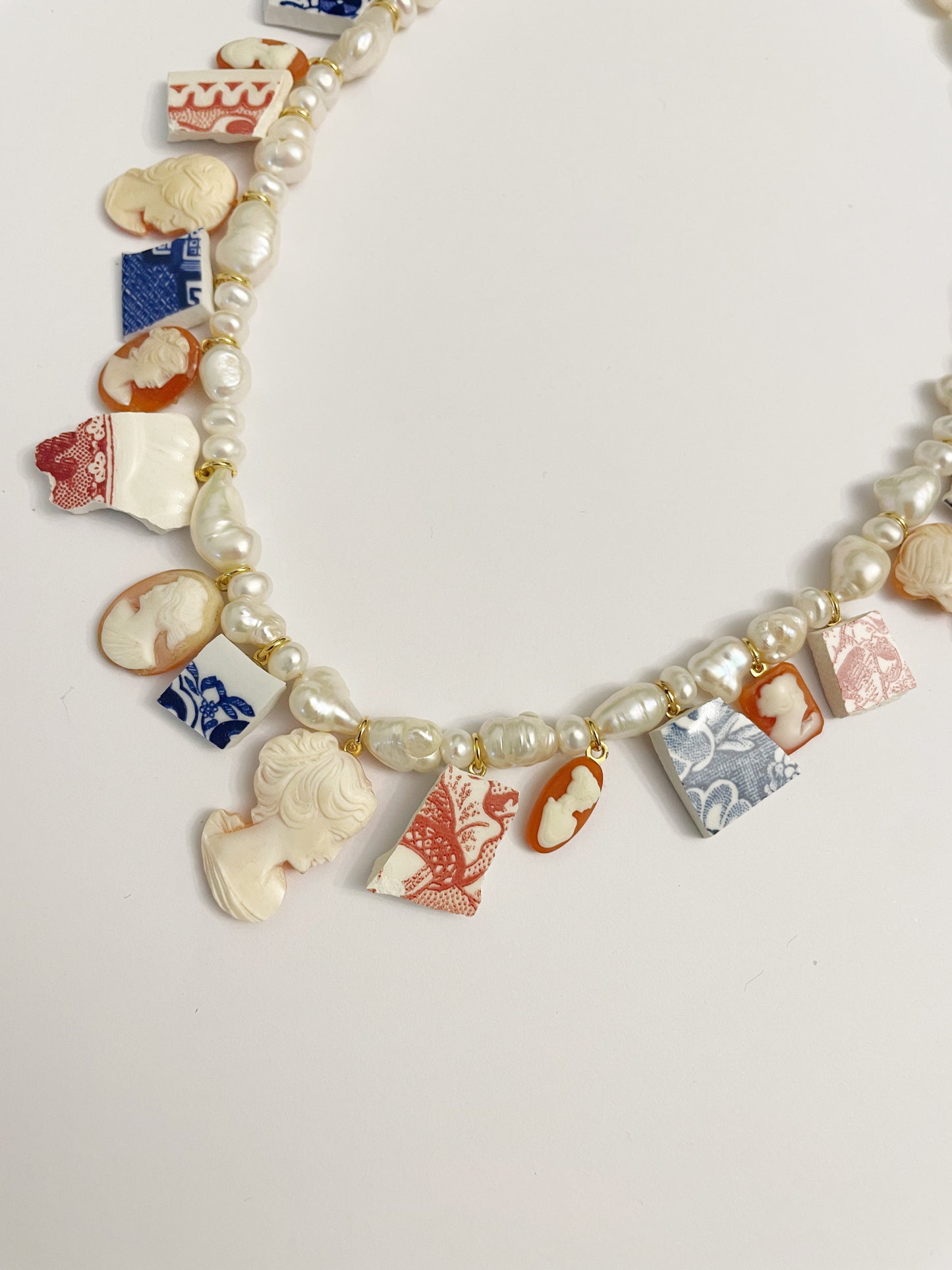 Curio cameo excavator necklace