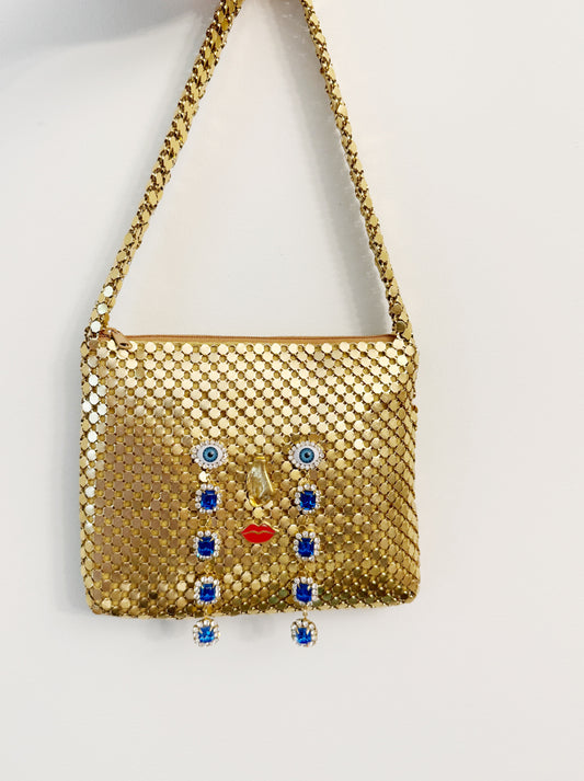 Ode to the master CRYBABY gold mesh purse