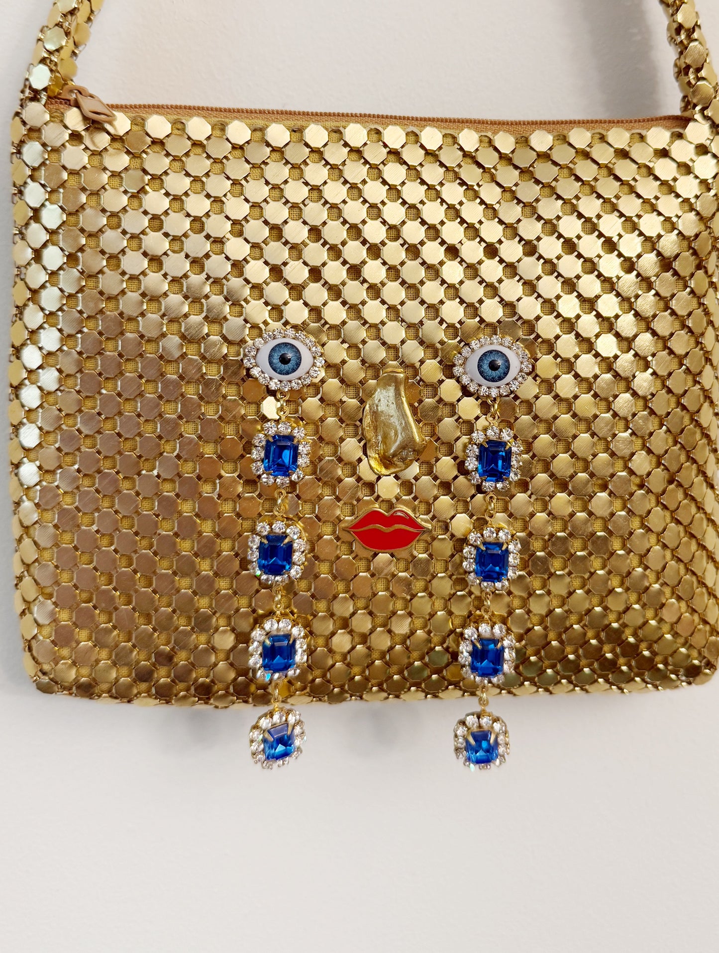 Ode to the master CRYBABY gold mesh purse