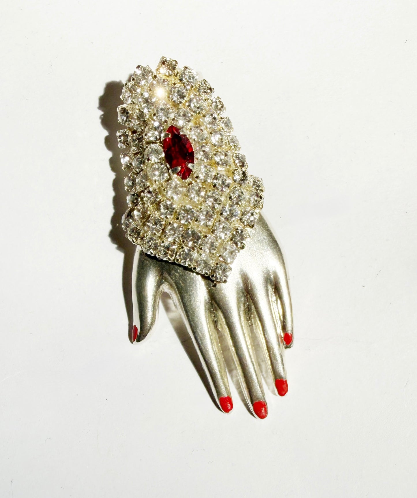 Regal rhinestone sterling silver hand brooch
