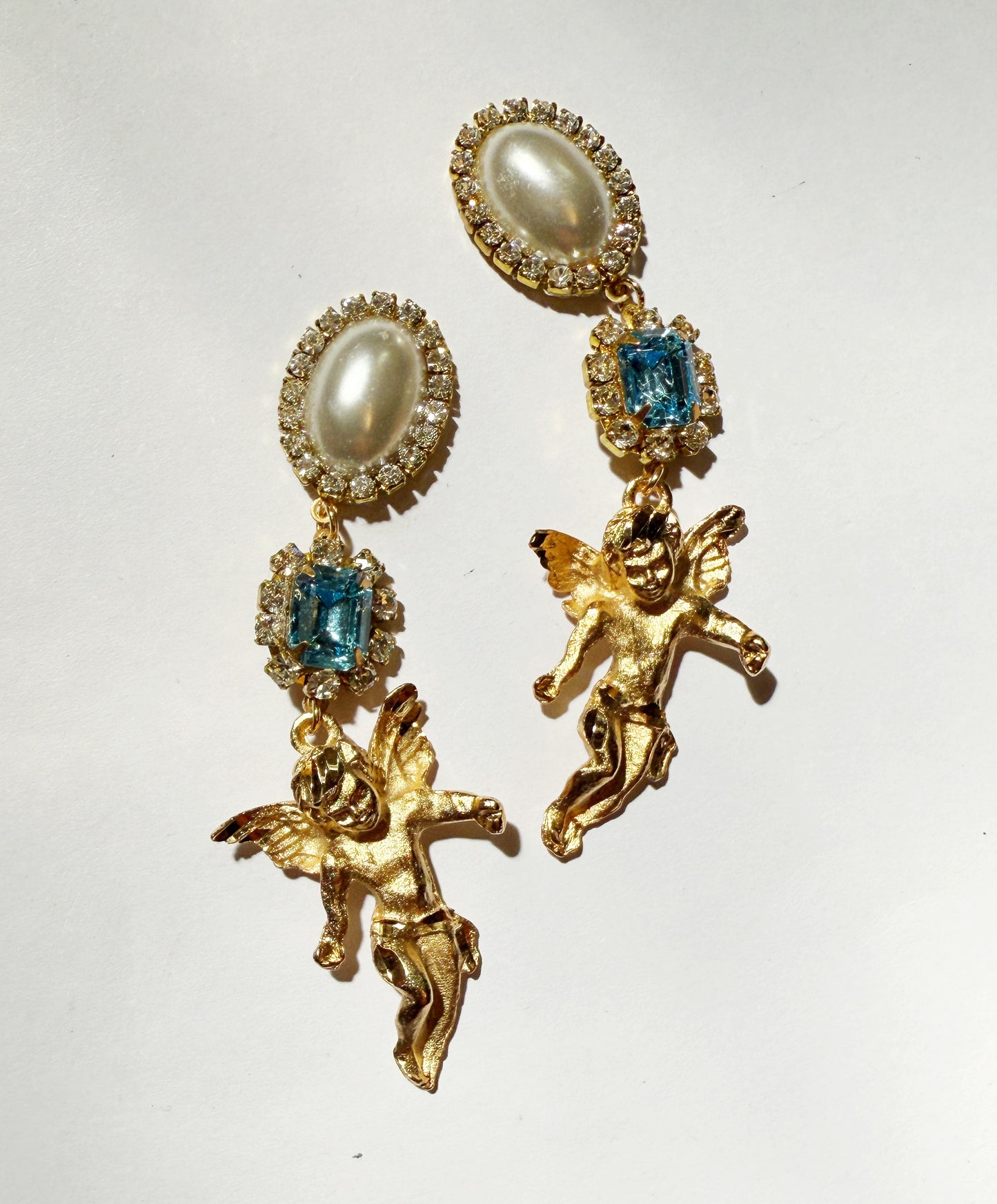 Cosmic cherub earrings