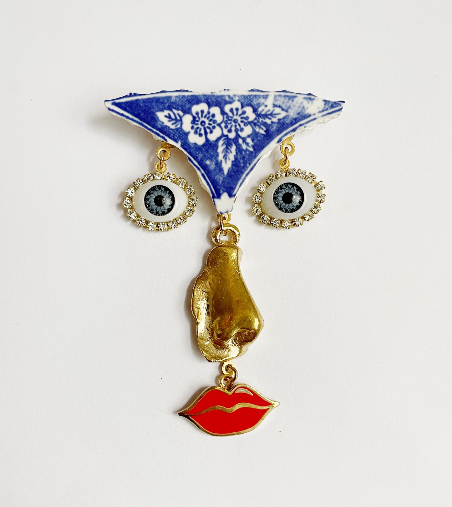 Ode to the master face brooch
