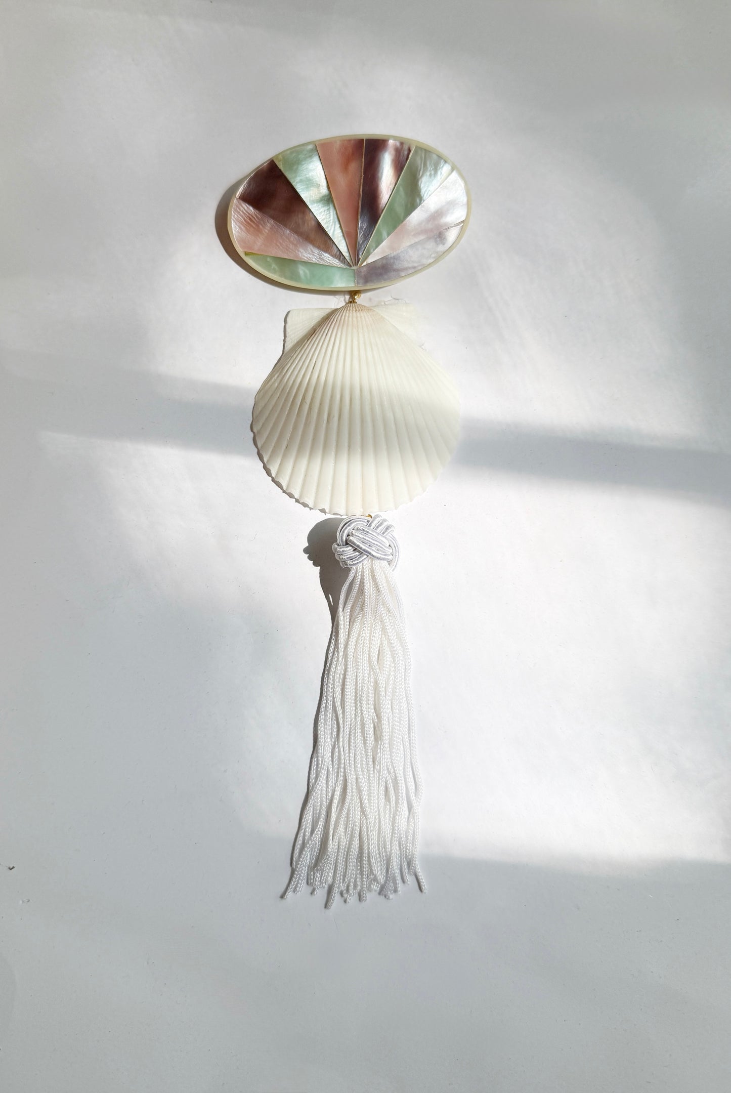 Mother of pearl shell tassel brooch
