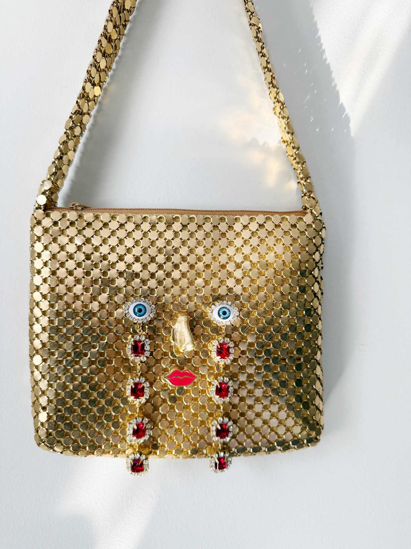 Ode to the master CRYBABY gold mesh purse