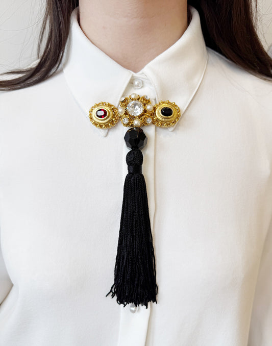 Regal rhinestone tassel brooch