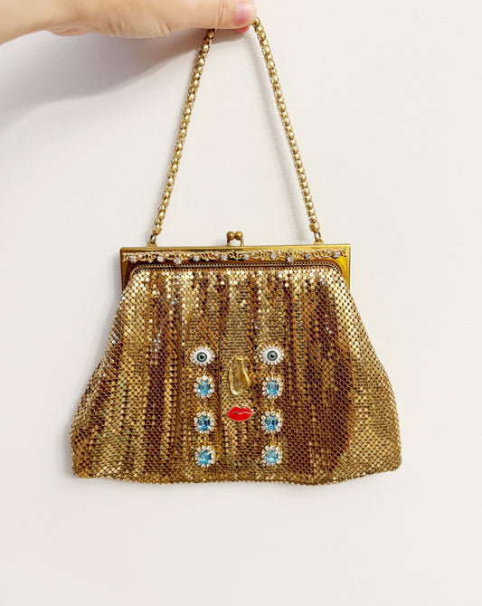 Ode to the master CRYBABY gold mesh purse