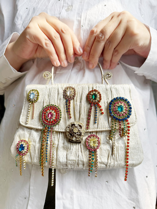 Misfit prize ribbon rhinestone purse