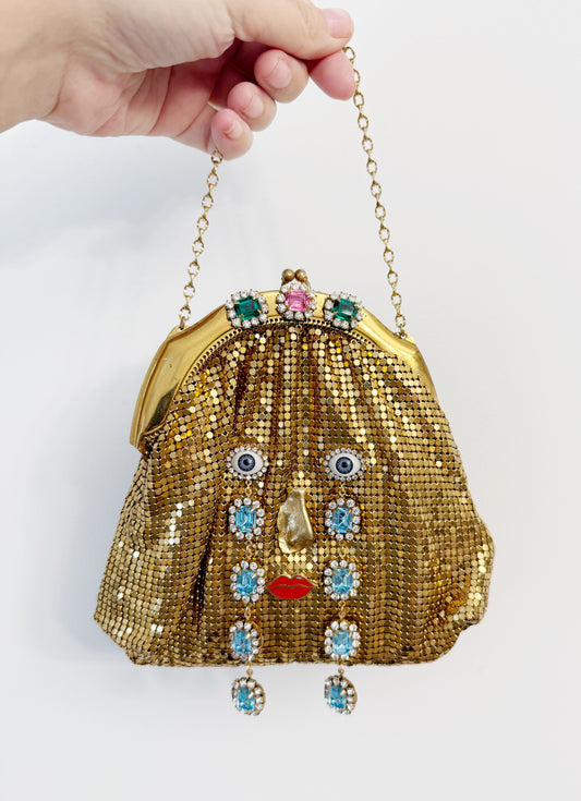Ode to the master CRYBABY gold mesh purse