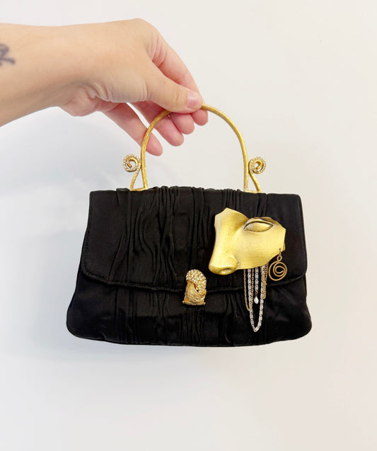 Surrealist face purse