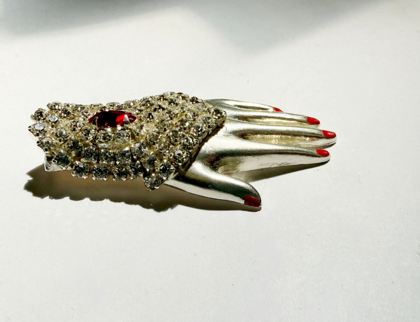 Regal rhinestone sterling silver hand brooch