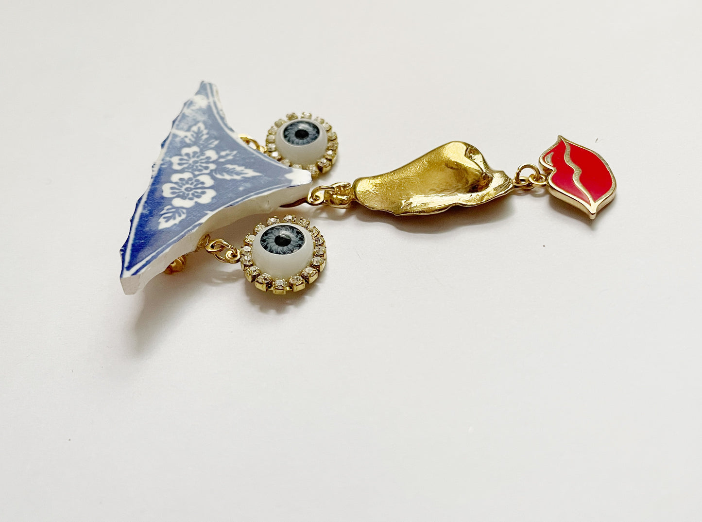 Ode to the master face brooch