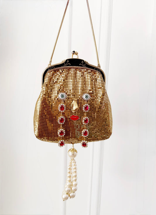 Ode to the master CRYBABY gold mesh tassel purse