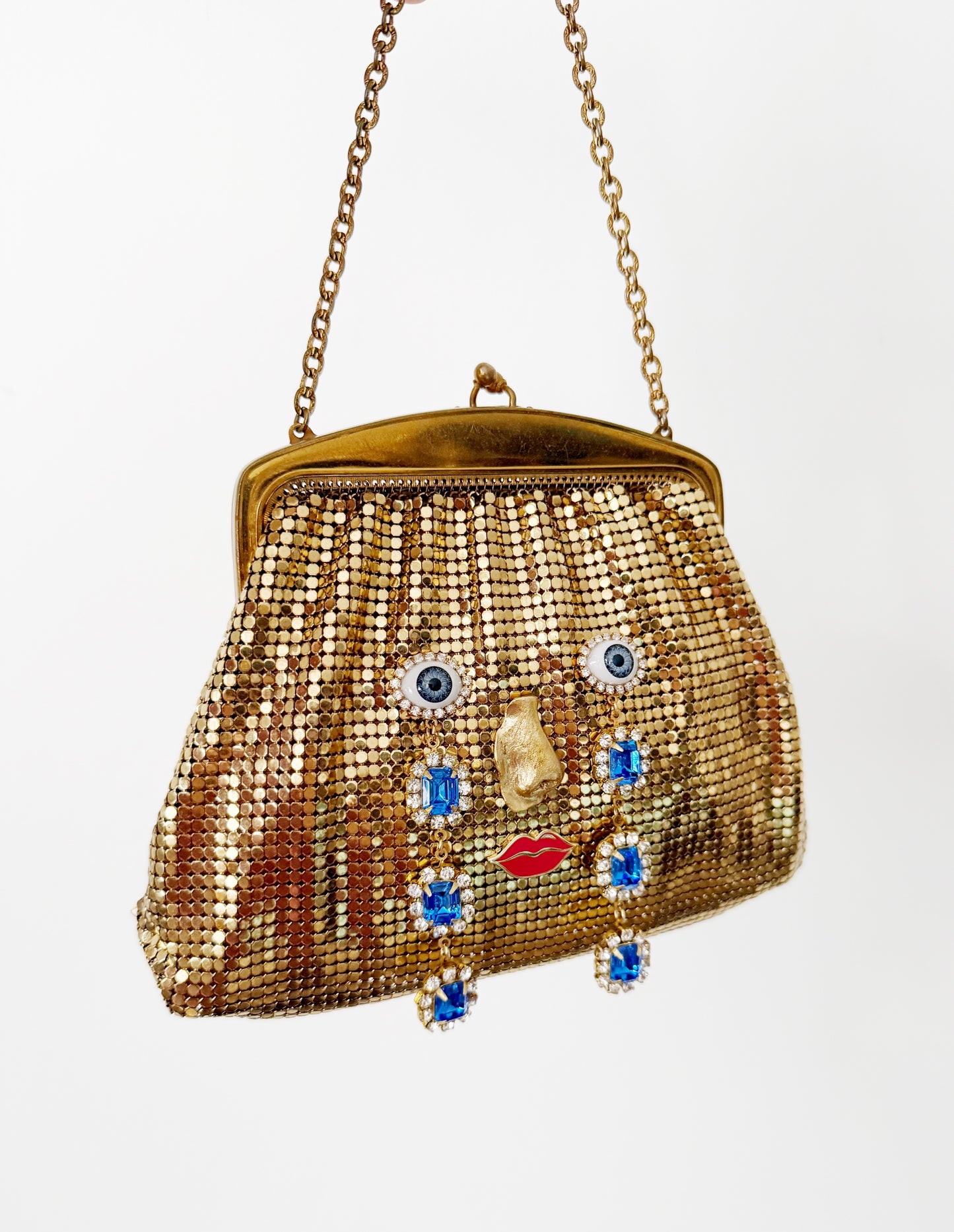 Ode to the master CRYBABY gold mesh purse