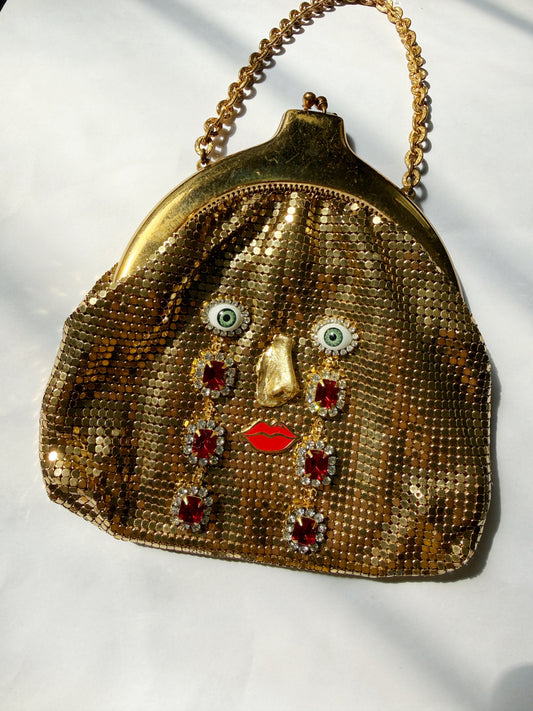Ode to the master CRYBABY gold mesh purse
