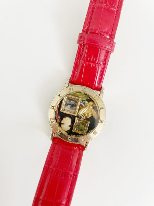 Miniature Marvels red gallery wall watch