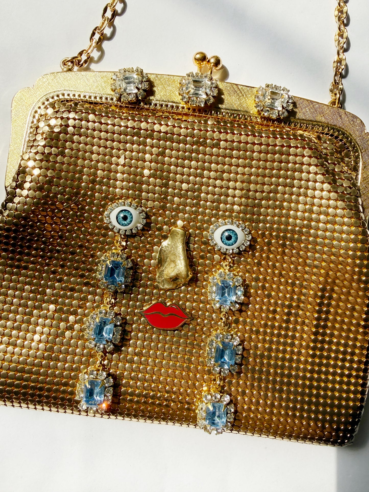 Ode to the master CRYBABY gold mesh purse